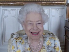 In this image from video issued by Buckingham Palace on Sunday, April 10, 2022, Queen Elizabeth speaks during a video link call and virtual visit to the Royal London Hospital on Wednesday April 6, 2022, to mark the official opening of the hospital's Queen Elizabeth Unit.