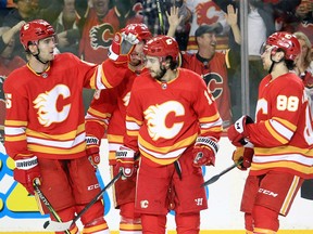 The Calgary Flames celebrate a goal from Johnny Gaudreau during the third period of action as the Calgary Flames beat the visiting Arizona Coyotes 9-1 at the Saddledome. April 16, 2022.