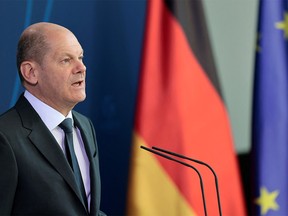 German Chancellor Olaf Scholz gives a press statement at the Chancellery in Berlin