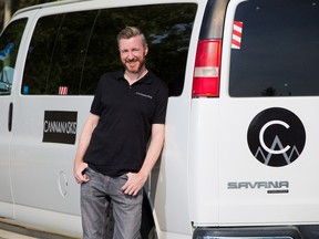 Dave Dormer with Cannanaskis stands with the van he uses to provide cannabis-focused tours in the Rocky Mountains.