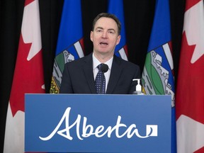 Alberta's Health Minister Jason Copping provides an update on COVID-19 in the province during a news conference in Edmonton on March 23, 2022.