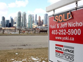 A realtor's sign in front of a property along Salisbury Ave. S.E. on April 16, 2022. Data obtained from Calgary tax assessment mailing records suggest there is very little foreign ownership of Calgary residential property.