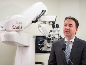 Health Minister Jason Copping speaks with the media at TLC Laser Eye Centres on Friday, April 22, 2022.