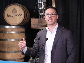 Doug Schweitzer, Minister of Jobs, Economy and Innovation, speaks at the Burwood Distillery in Calgary as the province announces  million for tourism recovery on Friday, April 22, 2022.