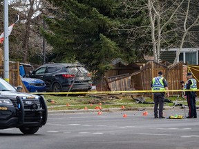 Two vehicles crashed through a fence in the southeast community of Midnapore.