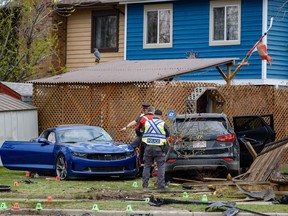 Calgary police are investigating the scene of a fatal collision at the intersection of Midlake Blvd. and Midpark Blvd. S.E. on Tuesday, May 3, 2022.