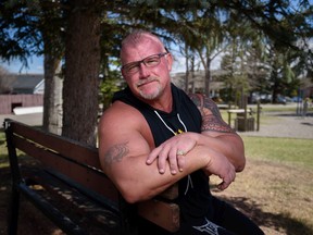 Robert Donoghue poses for a portrait while wearing his son's ring on May 6, 2022.