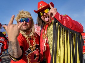 Brad Gogal, left, and Roger Leonard pose for a photo before the game 7 of the first round of play-off action between Calgary Flames and Dallas Stars at the Red Lot outside Scotiabank Saddledome on Sunday, May 15, 2022. Azin Ghaffari/Postmedia