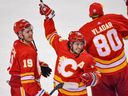 Calgary Flames forward Johnny Gaudreau and his teammates celebrate the forward's series-clinching goal in overtime against the Dallas Stars during Game 7 of their first-round playoff series at the Scotiabank Saddledome on Sunday May 15, 2022.