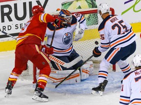 Calgary Flames Matthew Tkachuk scores against Edmonton Oilers Mikko Koskinen during the second period of the first game of the second round of playoff action at Scotiabank Saddledome on Wednesday, May 18, 2022. Azin Ghaffari/Postmedia