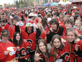 Flames fans celebrate at the Red Lot viewing party ahead of Game 6 between the Calgary Flames at Dallas Stars. Friday, May 13, 2022.