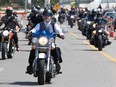 Over a hundred motorcyclists participate in the 11th annual Distinguished Gentleman’s Ride along 9th Ave SE. Dressed neat and trim, riders hit the streets of downtown to raise over $23,000 for Movember, a global charity supporting men battling prostate cancer. Sunday, May 22, 2022.