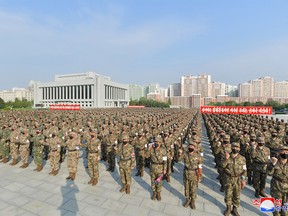 In this undated photo released by North Korea's Korean Central News, servicemen from the Korean People's Army Medical Corps attend the launch of a campaign to improve drug supplies amid the coronavirus disease (COVID-19) pandemic in Pyongyang, North Korea Agency (KCNA) on May 17, 2022.