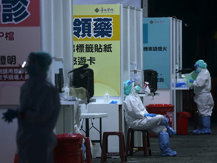  Medical workers staff a newly set up COVID-19 test drive-through site at Liberty Square in Taipei, Taiwan, on May 17.