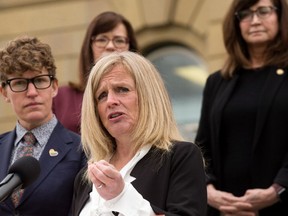 NDP Leader Rachel Notley and NDP MLAs call for a guarantee that the Alberta government will protect existing abortion services and work to expand access during a press conference on the steps of the Alberta Legislature in Edmonton on Tuesday, May 3, 2022.