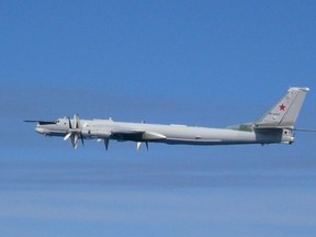 A file photo of a Russian TU-95 bomber flying over East China Sea in 2019. Joint Staff Office of the Defense Ministry of Japan/HANDOUT via REUTERS.