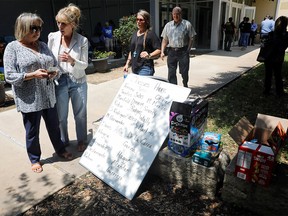 A board with the list of classes/teachers is displayed outside the SSGT Willie de Leon Civic Center, where students had been transported from Robb Elementary School to be picked up after a suspected shooting, in Uvalde, Texas, U.S. May 24, 2022.