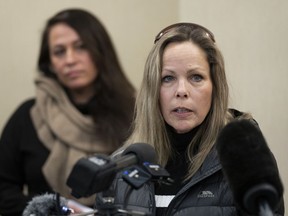 Tamara Lich, organizer of a protest convoy of truckers and supporters demanding an end to COVID-19 vaccine mandates, makes a statement during a news conference in Ottawa on Thursday, February 3, 2022.  Lich has been accused of breaching her bail conditions and The Crown argues she should be put back in jail pending her trial.