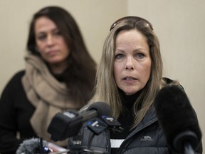 Tamara Lich, organizer of a protest convoy of truckers and supporters demanding an end to COVID-19 vaccine mandates, makes a statement during a news conference in Ottawa on Thursday, February 3, 2022. Lich has been accused of breaching her bail conditions and The Crown argues she should be put back in jail pending her trial.