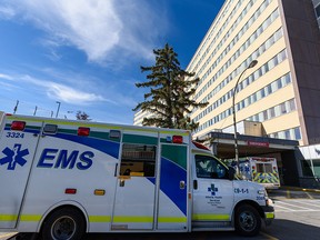 Ambulances parked at the emergency entrance of Foothills Medical Centre on Sept. 24, 2021.