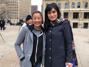 Olympic wrestler Carol Huynh and actor Linda Kee spoke during the Day of Action Against Anti-Asian Racism event in Calgary on Tuesday.
