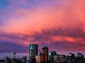It was a stunning sunrise as clouds glow over the downtown Calgary skyline on Wednesday, November 3, 2021. Calgary is rising again economically from seven long, lean years, writes Deborah Yedlin, CEO and president of the Calgary Chamber of Commerce.