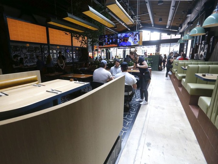  Diners can choose between a large patio outside and comfortable booths inside Central Taps and Food. Darren Makowichuk/Postmedia
