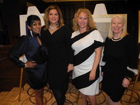 Left to right, Eileen Marikar of Keyera, Nancy Brennan, Kirsten Bell and Kelly Hill at OPC's flagship Cork and Canvas fundraising event held at the Calgary Petroleum Club.