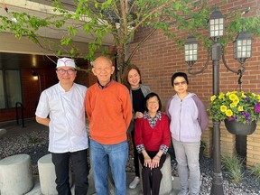 Clover Living director of operations Stella Chen (back row) with Chef Banny (L) and three of her happy residents.