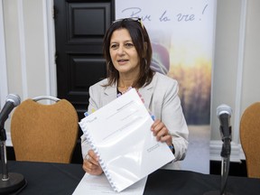 Quebec's coronavirus Géhane Kamel has copied a report on the death of a resident in a Quebec care facility at the start of the COVID-19 pandemic prior to a news conference in Montreal on Thursday, May 19, 2022. Holds.