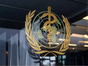 The logo of the World Health Organization is pictured at the entrance of the WHO building in Geneva, Switzerland, December 20, 2021.