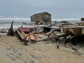 One of the collapsed houses in Rodanthe on May 10, 2022.
