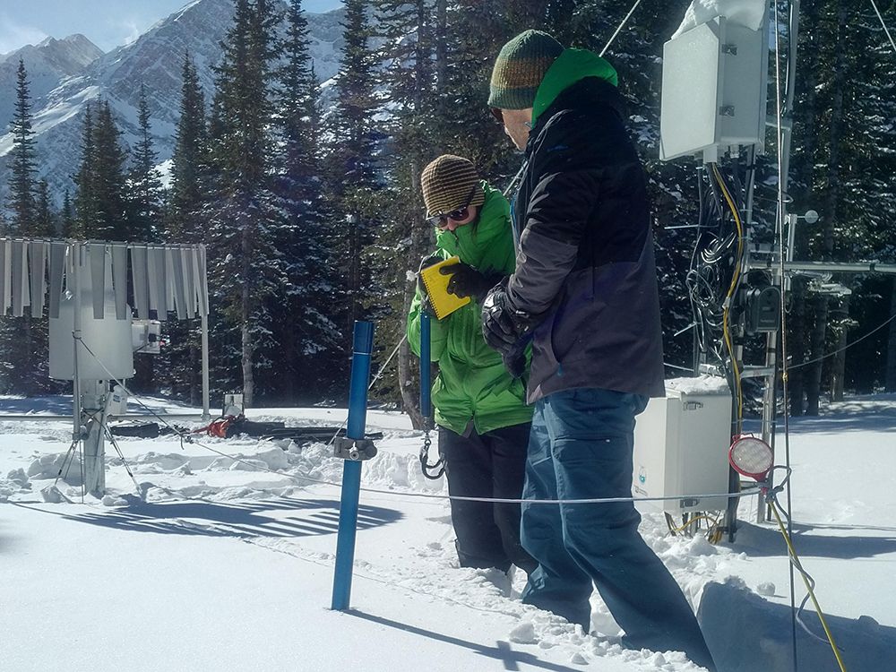 Researchers monitor snowpack levels in the Rocky Mountains this past winter.