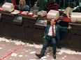 An exhausted trader slumps in his chair at the Toronto Stock Exchange October 19, 1987, known as Black Monday.