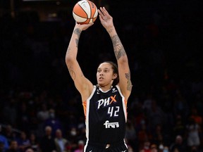 FILE PHOTO: Oct 13, 2021; Phoenix, Arizona, USA; Phoenix Mercury center Brittney Griner (42) shoots against the Chicago Sky during the first half of game two of the 2021 WNBA Finals at Footprint Center.