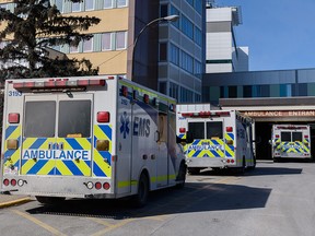 Ambulances line up outside the emergency entrance at Foothills Medical Centre on Thursday, March 10, 2022.