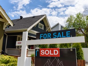 A real estate for sale sign in Calgary was photographed on Wednesday, June 1, 2022. Azin Ghaffari/Postmedia