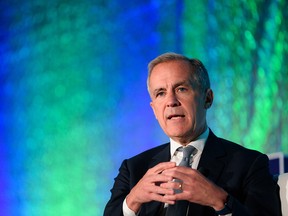 Economist and banker Mark Carney speaks at Alberta Relaunch 2022 in BMO Centre in Calgary on Tuesday.