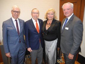 Brooks: Outstanding business leaders honored at awards ceremony From left to right: Jim Dewald, Dean of the Haskayne School of Business, Dick Haskayne, Heather Culbert and her husband Mike Culbert.