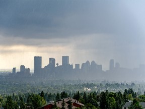 FILE PHOTO - A thunderstorm sweeps into Calgary on July 23, 2020.