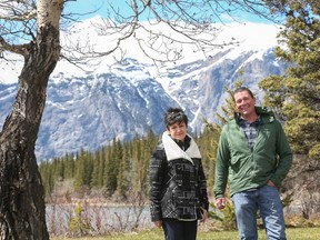 Development partners Janet Brewster and Shane Jonker walk the land where the new Brewster Kananaskis Ranch Development housing development will be built along the Bow River in Kananaskis.