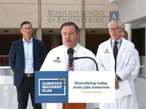 Alberta Premier Jason Kenney speaks to guests and media following a tour of the the lab areas at the University of Calgary's Earth Science building in Calgary on Thursday, June 9, 2022.