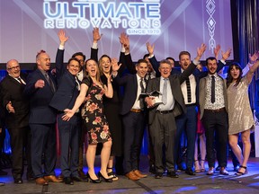 Ultimate Renovations’ staff can’t contain their excitement as they accept the BILDCR Grand Award for Renovator of the Year.  RIMY REEHAL
