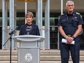 FILE PHOTO: Calgary Mayor Jyoti Gondek is flanked by Calgary Fire Chief Steve Dongworth on Thursday, June 9, 2022.
