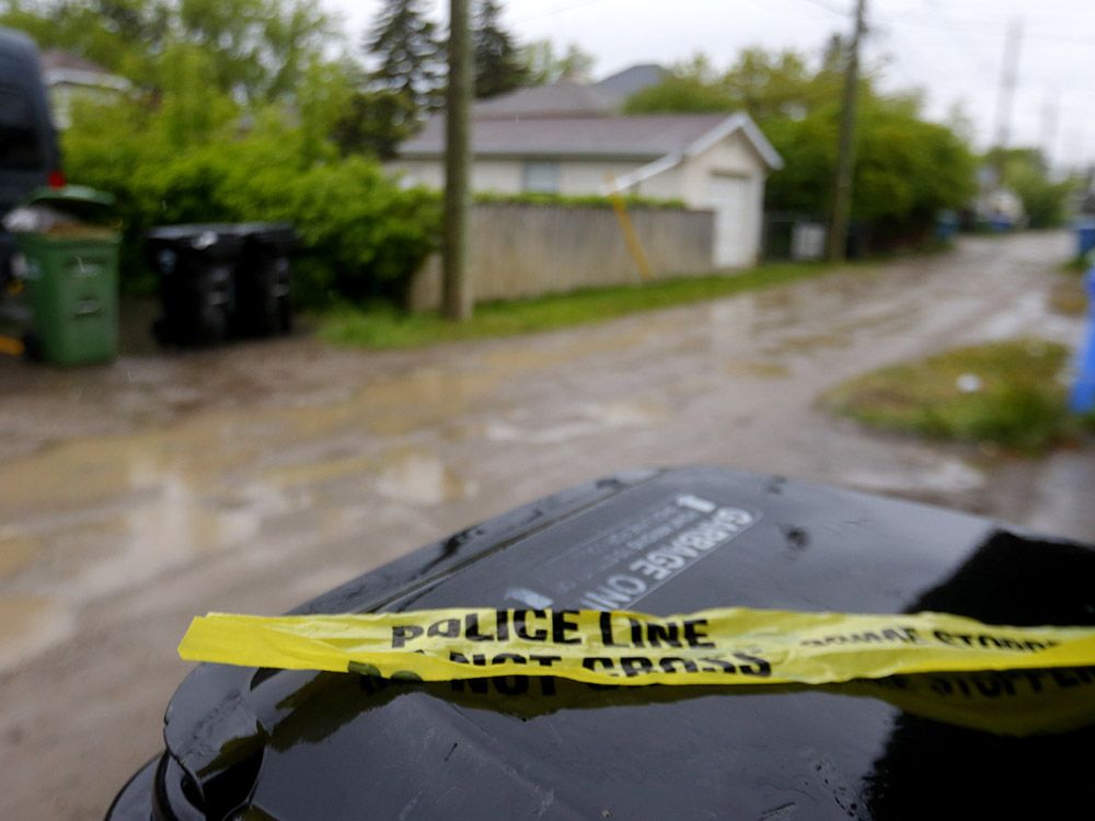 Back alley in the 2100 block of 15th Avenue N.W. where an 83-year-old women was attacked and killed by three dogs in Calgary on Sunday, June 5, 2022.