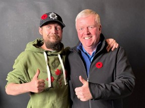 Retired General Rick Hillier, right, with Jess Larochelle of Restoule. Hiller is one of many high ranking veterans who is making the case that Larochelle should be awarded Canada's Victoria Cross for his act of bravery that saved the lives of his platoon members in a firefight with the Taliban in Afghanistan in 2006.