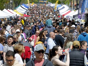 Crowds of festival-goers jam the Lilac Festival returned along 4th Street and 17th Avenue S.W. on Sunday.