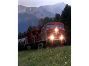 A Canadian Pacific Railway train makes its way through the Rockies between Banff and Lake Louise, Alta., Tuesday August 28, 2001. The backers of a proposed passenger train that would connect Calgary to Banff say they are waiting for a yes or no from the Alberta government before proceeding to the detailed design phase.