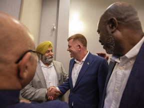 Brian Jean greets a supporter during his official campaign launch for the UCP leadership on Wednesday, June 15, 2022 in Edmonton.