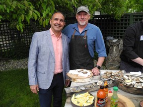 Brooks: Rouge Garden Party raises money for men and girls Hosts with the most, Rouge co-owners Olivier Reynaud and Paul Rogalski.